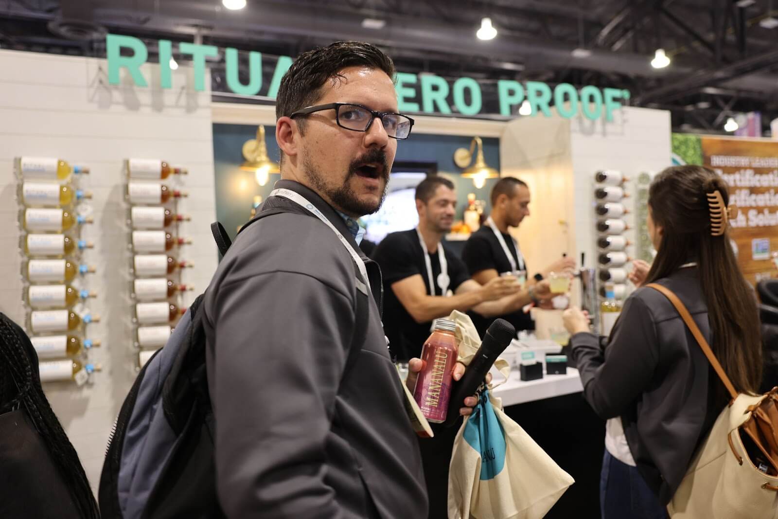 Tim at Ritual Zero Proof's booth at expo east 2022