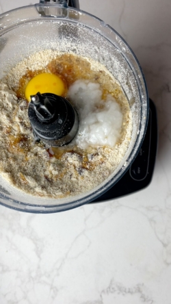 Add coconut oil, honey, vanilla, and egg