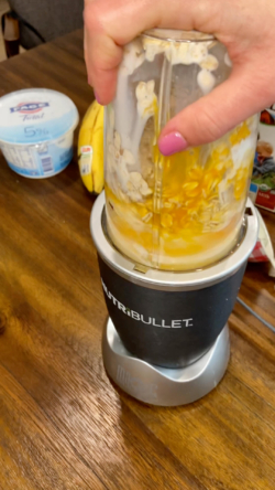 Add everything except blueberries to a blender and blend until smooth
