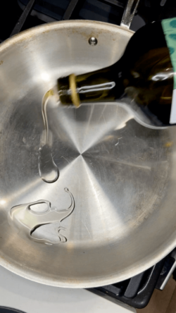 pour oil into pan