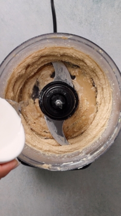 Drizzle in 2 tablespoons of ice water, and blend until the mixture is ultra smooth, pale and creamy.