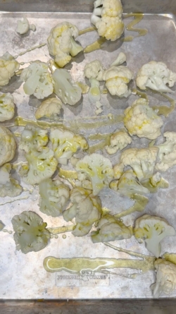 Coat with olive oil and salt on a baking sheet.
