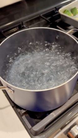 Boil large part of water for pasta and preheat oven to 350F
