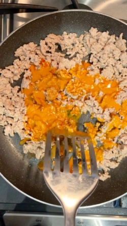Add in Primal Kitchen’s Buffalo Sauce and mix.