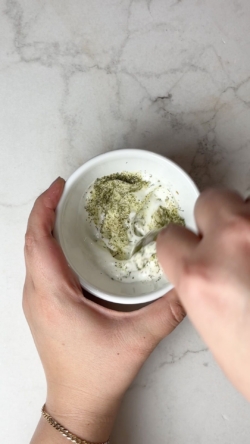 While zucchinis are cooking, add greek yogurt and ranch seasoning blend to a bowl. Mix thoroughly.