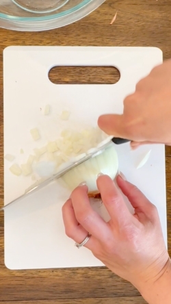 While the tofu is pressing, dice a yellow onion and set aside.