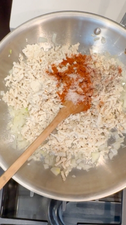 Add in the shredded tofu and spices
