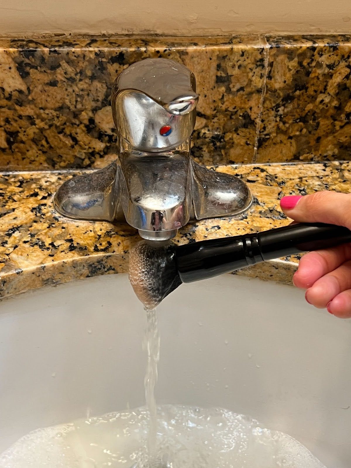 Wet the makeup bristles.