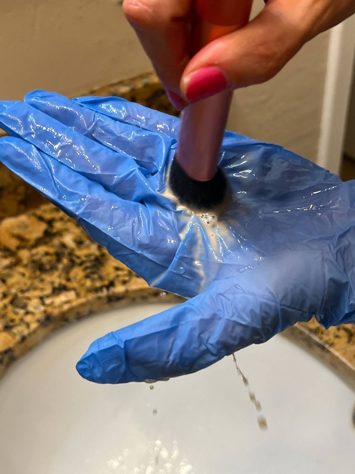 Apply a gentle cleanser such as Dawn dish soap, Ivory soap, baby shampoo, or a brush-specific cleanser––such as this one from Beauty Blender––to the makeup brush bristles.