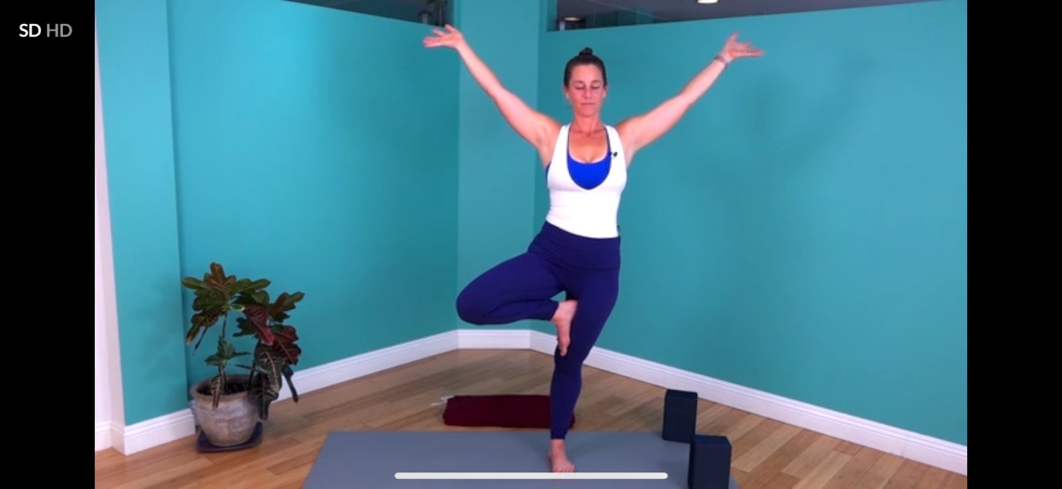 Screenshot of a yoga class video on the Yoga Time yoga app.